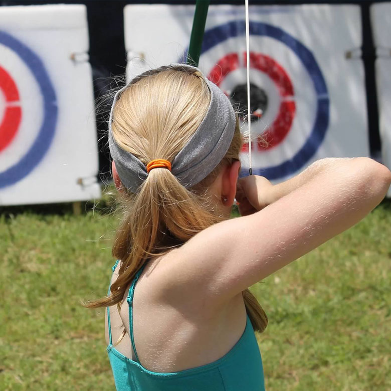 Girl Aiming at Archery Target